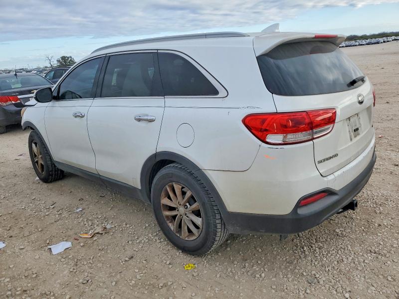 Photo 2 from auction – 2016 KIA SORENTO LX with VIN 5XYPG4A34GG023442