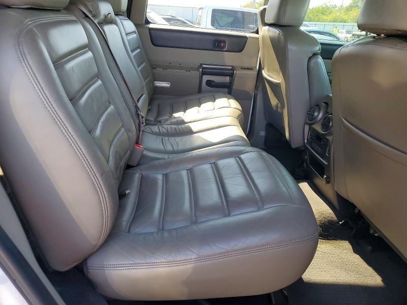 Photo 11 from auction – 2004 HUMMER H2 with VIN 5GRGN23U94H111338