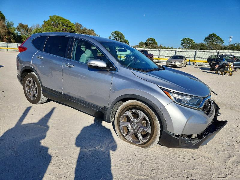 Photo 4 from auction – 2019 HONDA CR-V with VIN 7FARW1H59KE024446