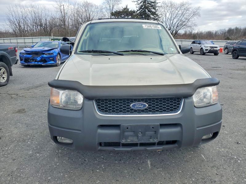 Photo 5 from auction – 2003 FORD ESCAPE XLT with VIN 1FMYU931X3KD77407