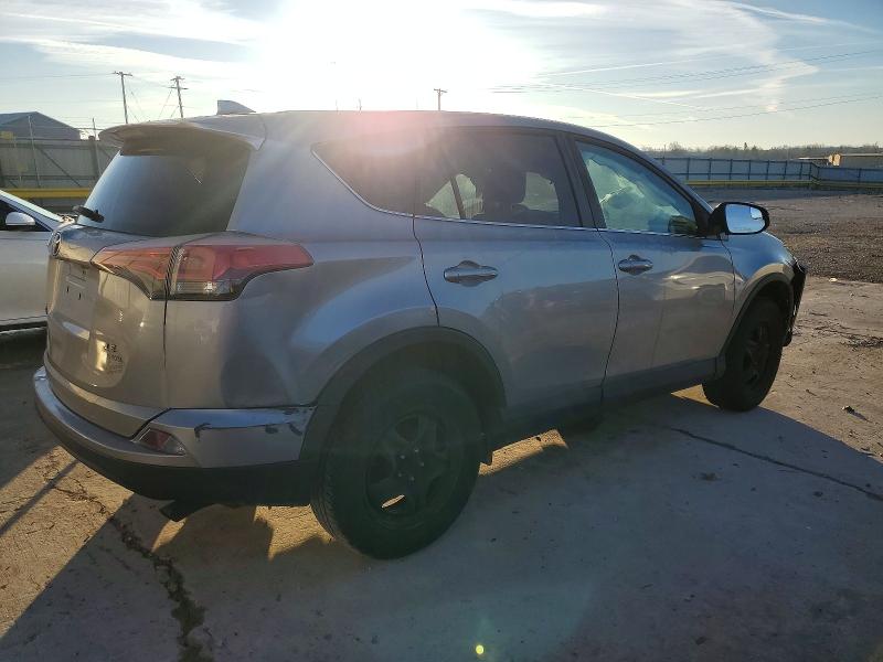 Photo 3 from auction – 2018 TOYOTA RAV4 LE with VIN 2T3ZFREV8JW450250