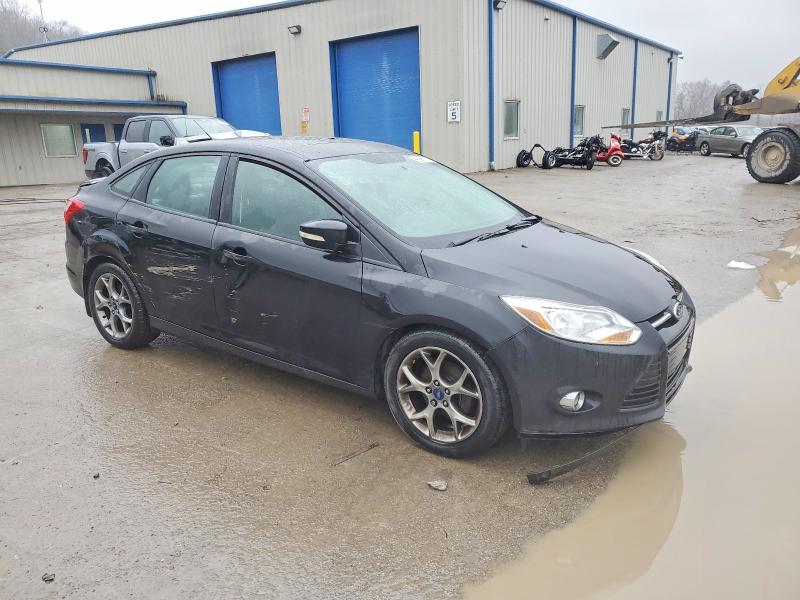 Photo 4 from auction – 2013 FORD FOCUS SE with VIN 1FADP3F27DL130441