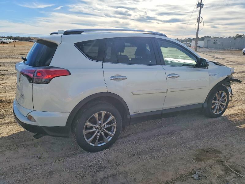 Photo 3 from auction – 2016 TOYOTA RAV4 HV LI with VIN JTMDJREV0GD021473