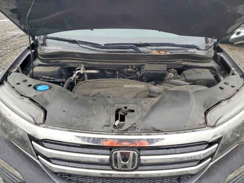 Photo 12 from auction – 2016 HONDA PILOT TOUR with VIN 5FNYF6H98GB106795