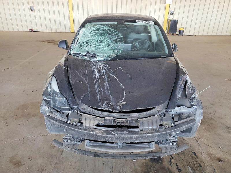 Photo 5 from auction – 2023 TESLA MODEL 3 with VIN 5YJ3E1EA4PF707247