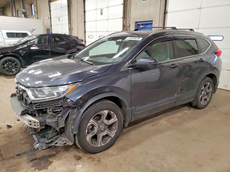 Photo 1 from auction – 2018 HONDA CR-V EX with VIN 7FARW2H54JE059299