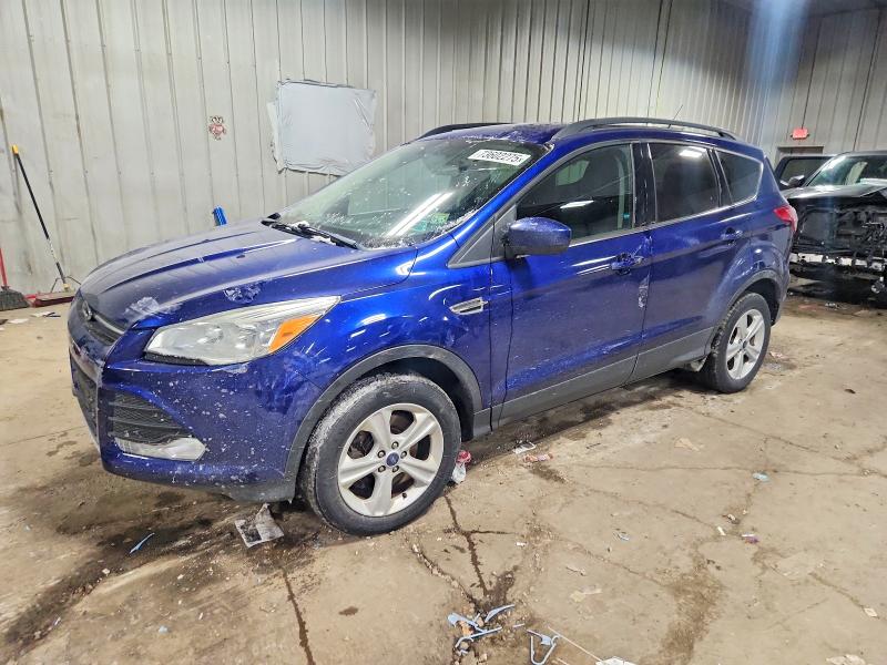 FORD ESCAPE SE 2016 with VIN 1FMCU9GX6GUC41004 - Photo from auction