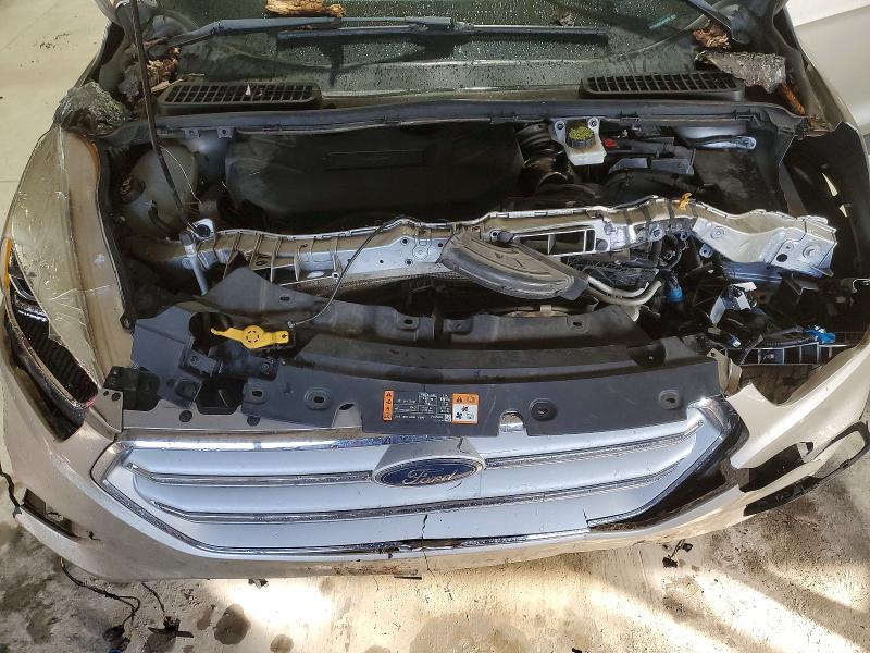 Photo 12 from auction – 2018 FORD ESCAPE with VIN 1FMCU9J99JUD48680