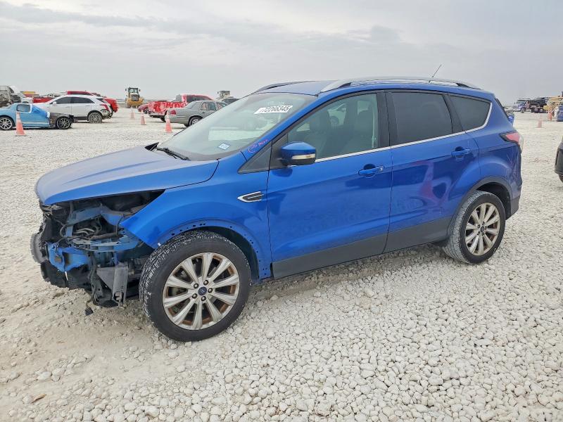 FORD ESCAPE TIT 2017 with VIN 1FMCU0J95HUC13797 - Photo from auction
