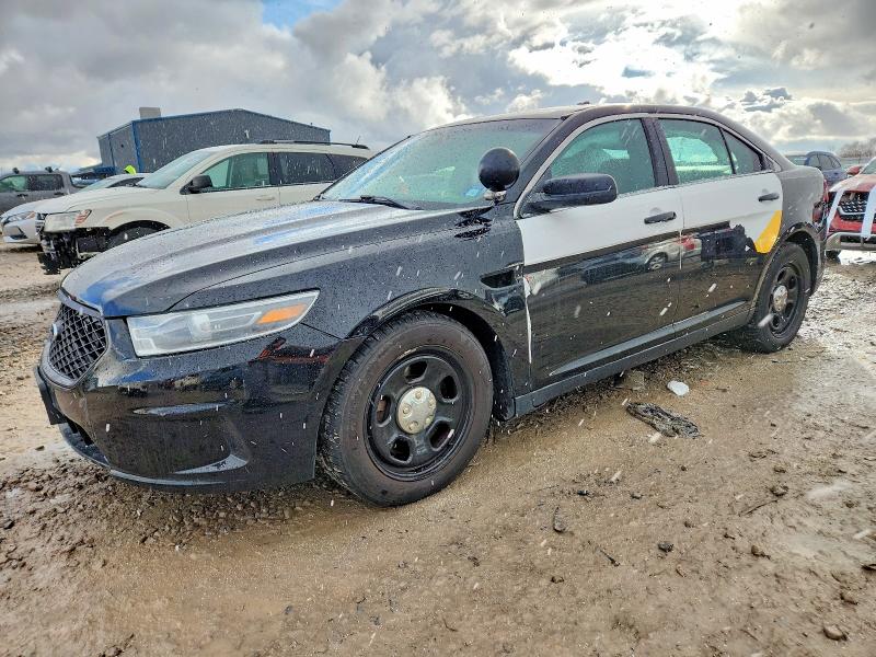 FORD TAURUS POL 2014 with VIN 1FAHP2MKXEG166617 - Photo from auction