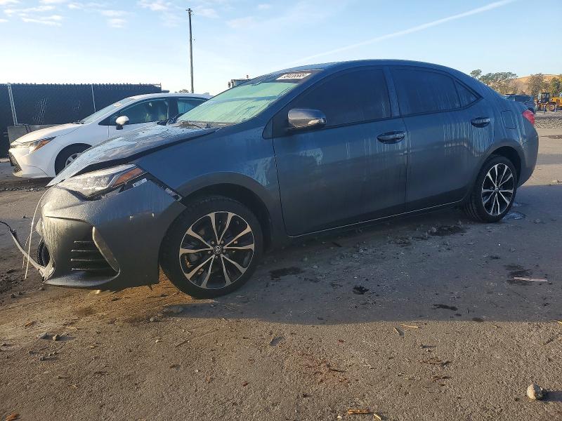 TOYOTA COROLLA L 2018 with VIN 5YFBURHEXJP762583 - Photo from auction