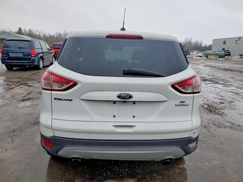 Photo 6 from auction – 2016 FORD ESCAPE with VIN 1FMCU0GXXGUC14335