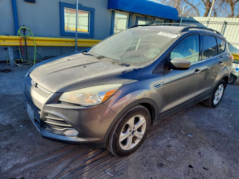 FORD ESCAPE 2014 with VIN 1FMCU0GX1EUD72768 - Photo from auction