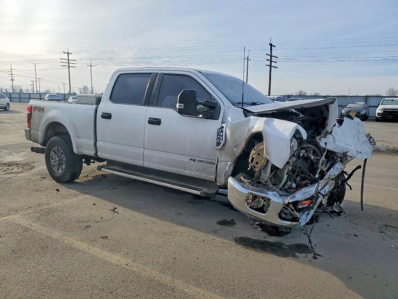 Photo 4 from auction – 2022 FORD F350 SUPER with VIN 1FT8W3BT8NEF69764