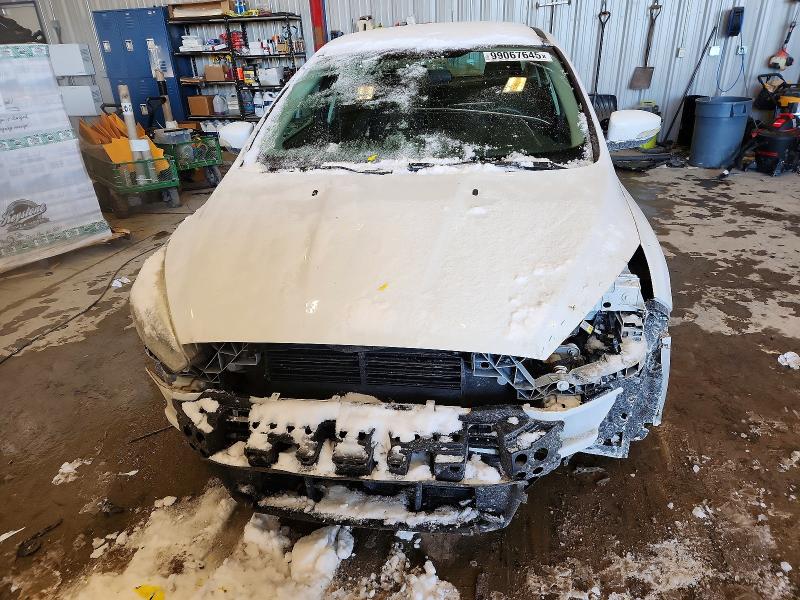 Photo 5 from auction – 2015 FORD FOCUS with VIN 1FADP3F24FL373157