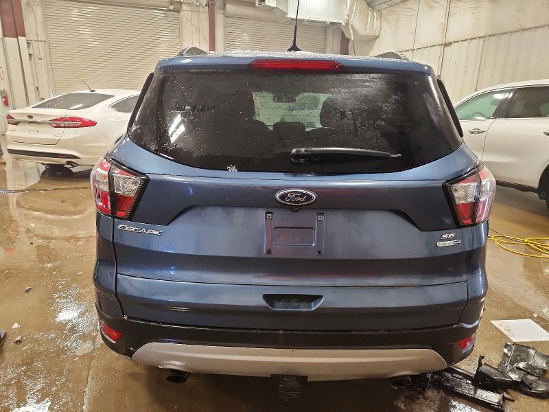 Photo 6 from auction – 2018 FORD ESCAPE SE with VIN 1FMCU9GD7JUB68805