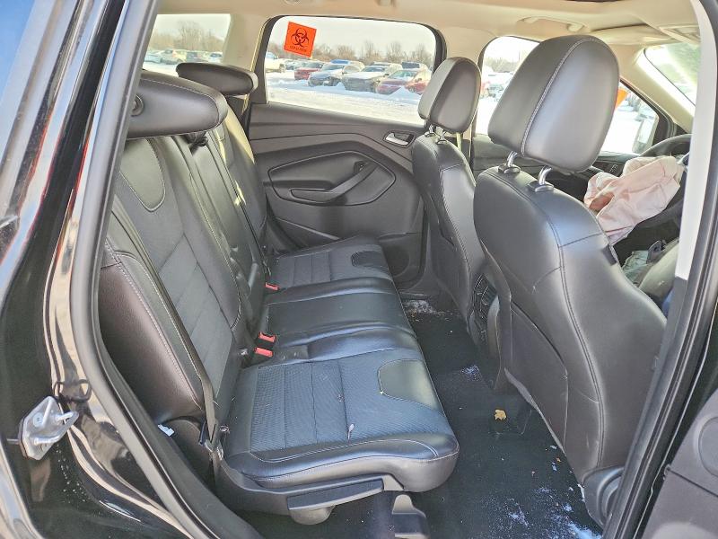 Photo 11 from auction – 2016 FORD ESCAPE with VIN 1FMCU9GX8GUC48553