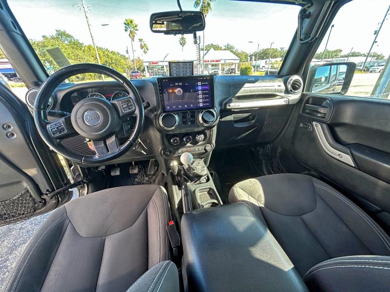 Photo 9 from auction – 2016 JEEP WRANGLER U with VIN 1C4BJWFG9GL235583