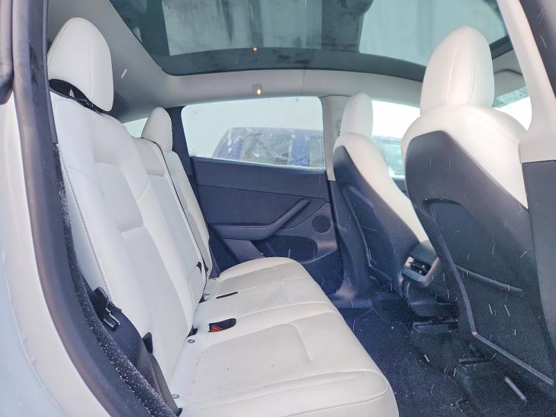 Photo 11 from auction – 2023 TESLA MODEL Y with VIN 7SAYGDEE3PF673406