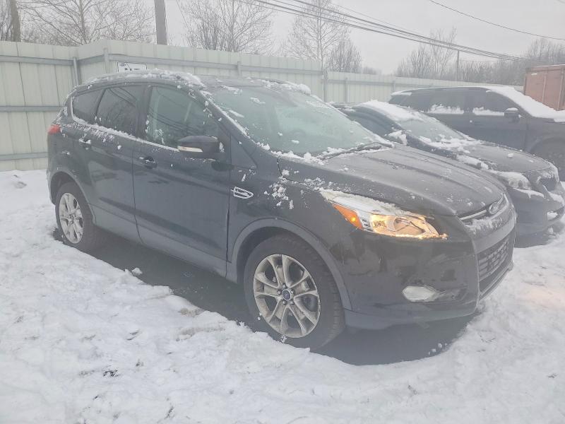 Photo 4 from auction – 2014 FORD ESCAPE TIT with VIN 1FMCU9JX5EUE45377