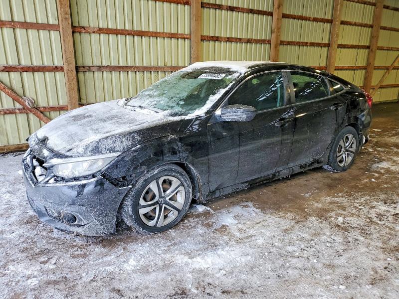 HONDA CIVIC LX 2017 with VIN 2HGFC2F60HH007595 - Photo from auction