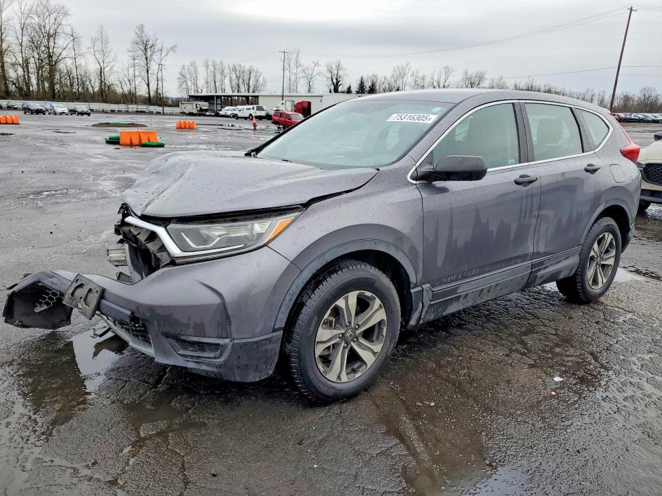 HONDA CR-V LX 2019 with VIN 5J6RW6H36KL001074 - Photo from auction