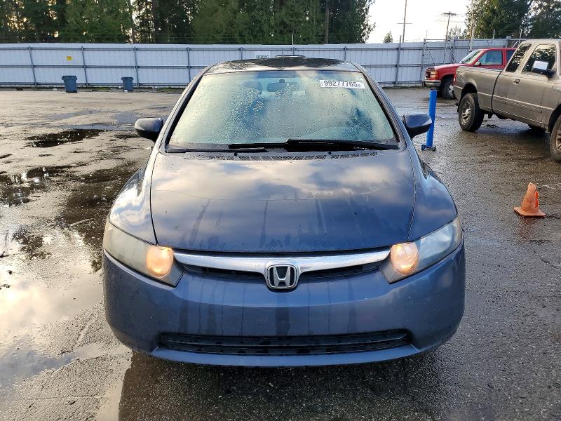 Photo 5 from auction – 2007 HONDA CIVIC HYBR with VIN JHMFA36277S027369