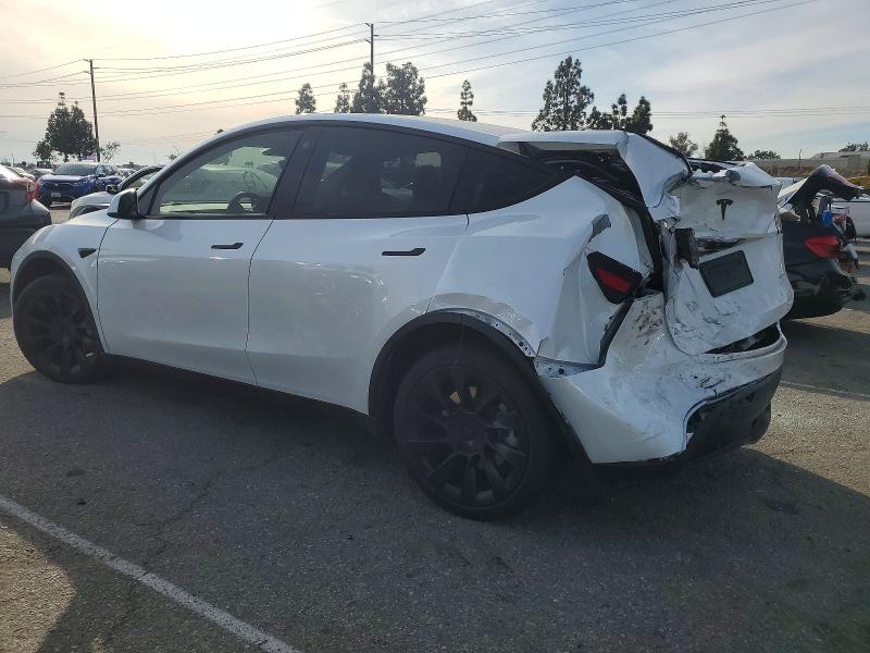 Photo 2 from auction – 2023 TESLA MODEL Y with VIN 7SAYGDEE0PA113565