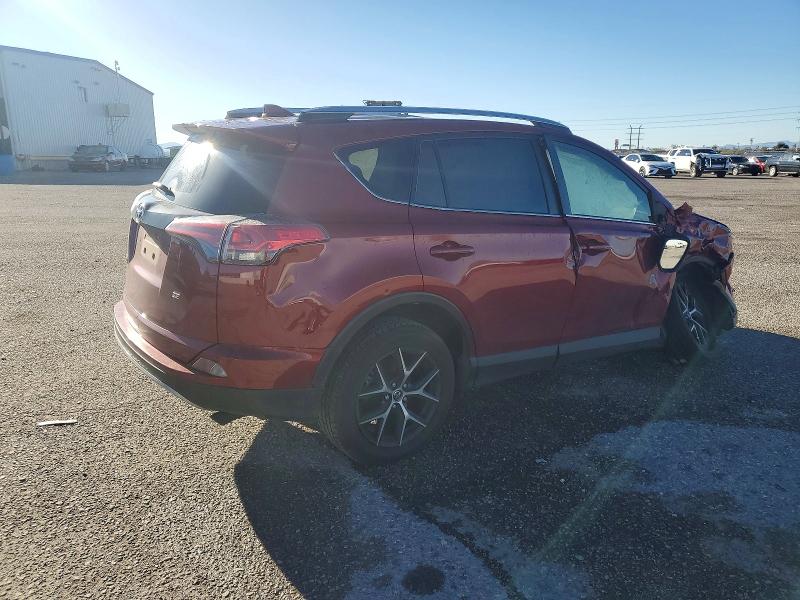 Photo 3 from auction – 2018 TOYOTA RAV4 SE with VIN JTMNFREV0JD123529