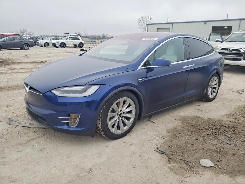 TESLA MODEL X 2017 with VIN 5YJXCAE29HF044775 - Photo from auction