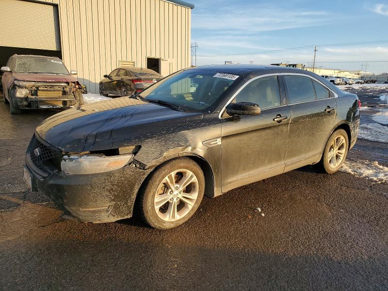 FORD TAURUS SEL 2014 with VIN 1FAHP2E80EG143530 - Photo from auction