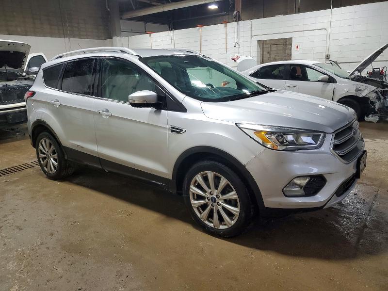 Photo 4 from auction – 2017 FORD ESCAPE TIT with VIN 1FMCU9JD3HUB97771