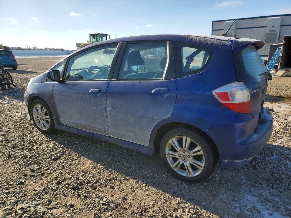 Photo 2 from auction – 2009 HONDA FIT with VIN JHMGE88459S026342