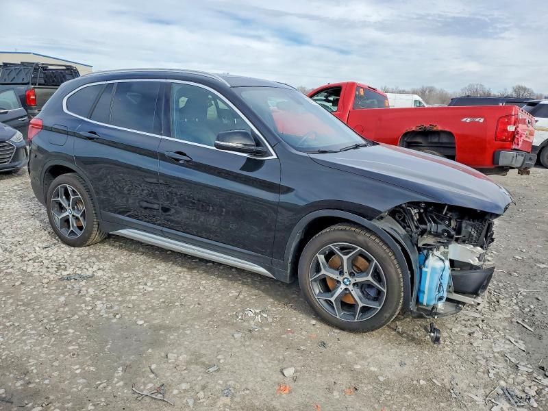 Photo 4 from auction – 2019 BMW X1 XDRIVE2 with VIN WBXHT3C50K5L89332