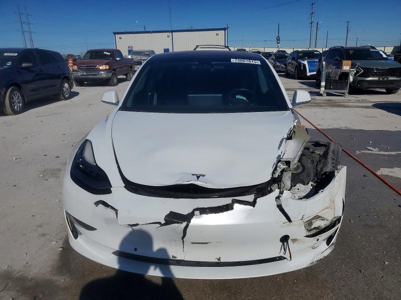 Photo 5 from auction – 2018 TESLA MODEL 3 with VIN 5YJ3E1EB9JF067746