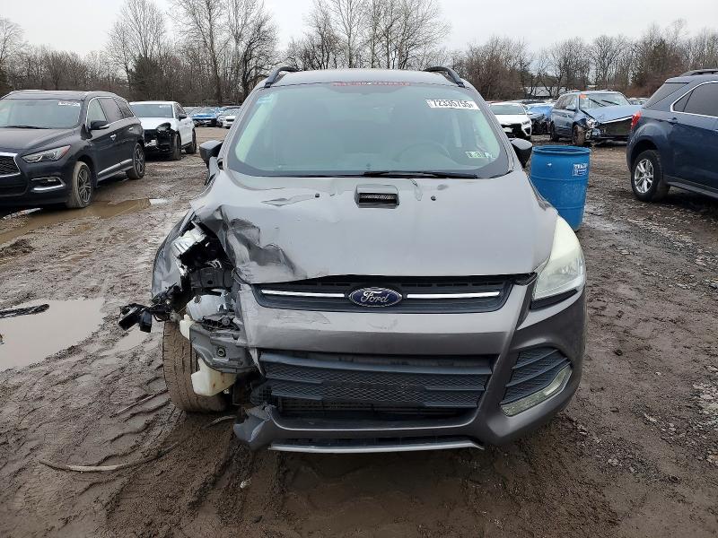 Photo 5 from auction – 2014 FORD ESCAPE SE with VIN 1FMCU9G95EUE28877