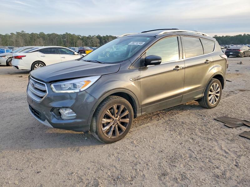 FORD ESCAPE TIT 2018 with VIN 1FMCU9J91JUC33801 - Photo from auction