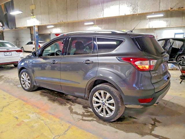 Photo 2 from auction – 2017 FORD ESCAPE TIT with VIN 1FMCU0J98HUA27610