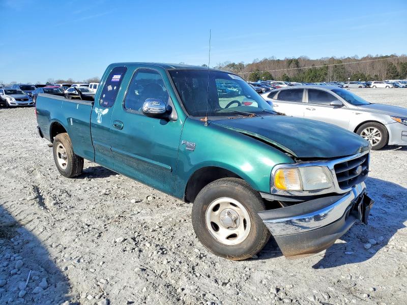 Photo 4 from auction – 2000 FORD F150 with VIN 1FTRX17W6YNB74835