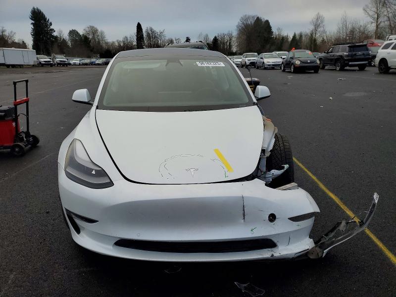 Photo 5 from auction – 2021 TESLA MODEL 3 with VIN 5YJ3E1EB1MF067986