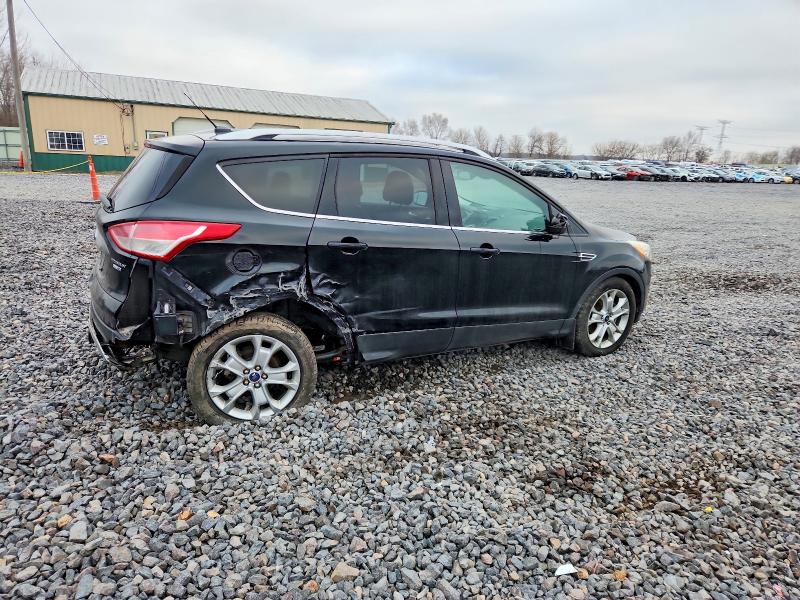 Photo 3 from auction – 2016 FORD ESCAPE TIT with VIN 1FMCU9J93GUB20876