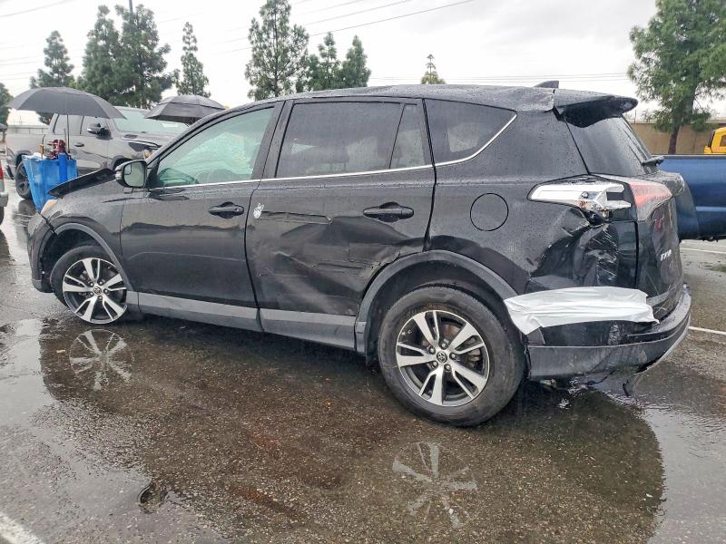 Photo 2 from auction – 2018 TOYOTA RAV4 with VIN 2T3WFREV0JW484668