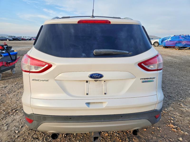 Photo 6 from auction – 2013 FORD ESCAPE TIT with VIN 1FMCU0J94DUC84032