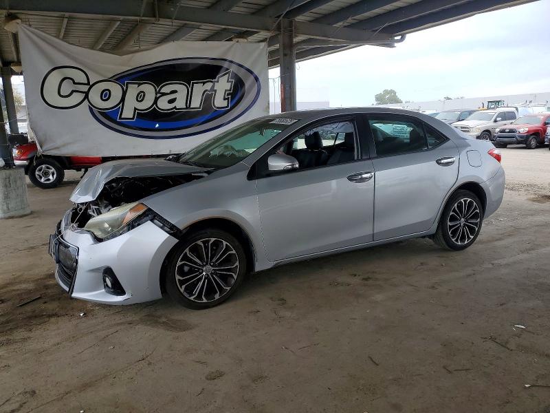 TOYOTA COROLLA L 2014 with VIN 5YFBURHE5EP157053 - Photo from auction