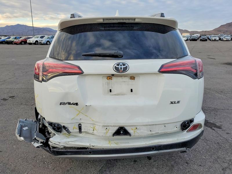 Photo 6 from auction – 2017 TOYOTA RAV4 XLE with VIN JTMWFREV7HJ714361