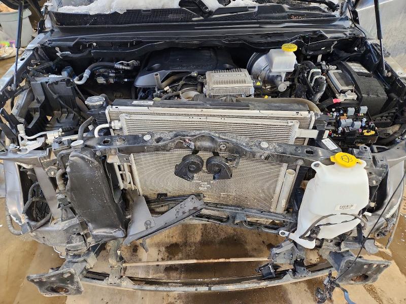 Photo 11 from auction – 2023 RAM 1500 with VIN 1C6SRFVT1PN681049