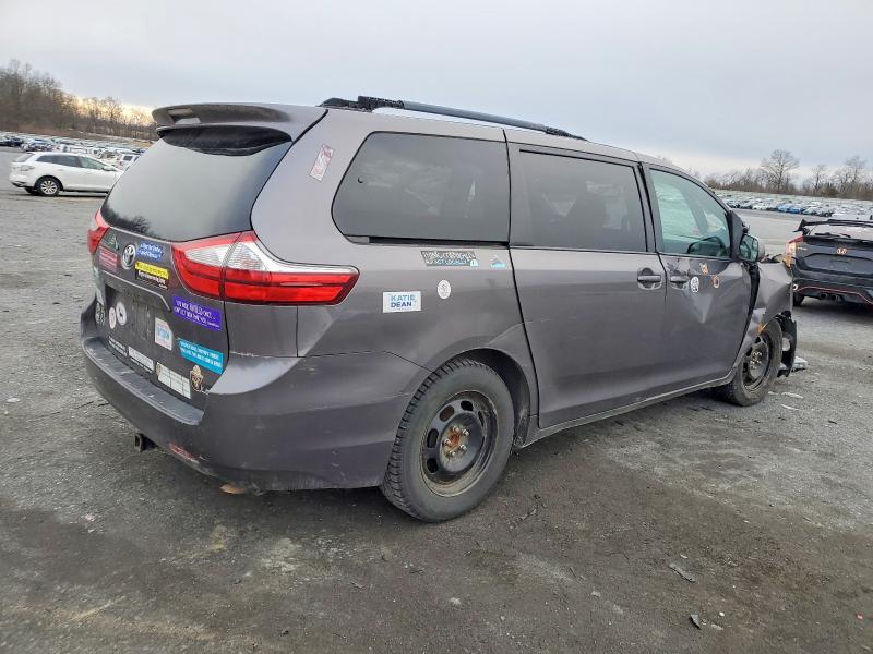 Photo 3 from auction – 2015 TOYOTA SIENNA LE with VIN 5TDKK3DC1FS588067