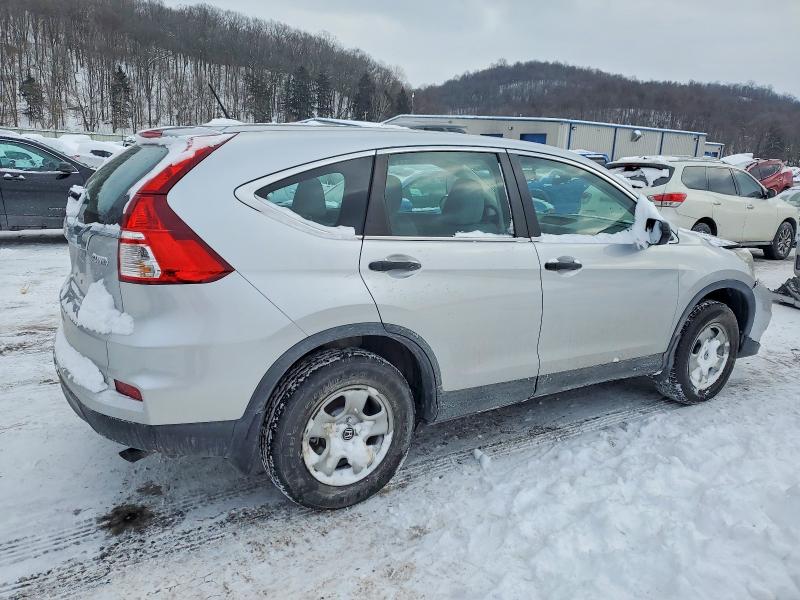 Photo 3 from auction – 2015 HONDA CR-V LX with VIN 5J6RM4H34FL082544