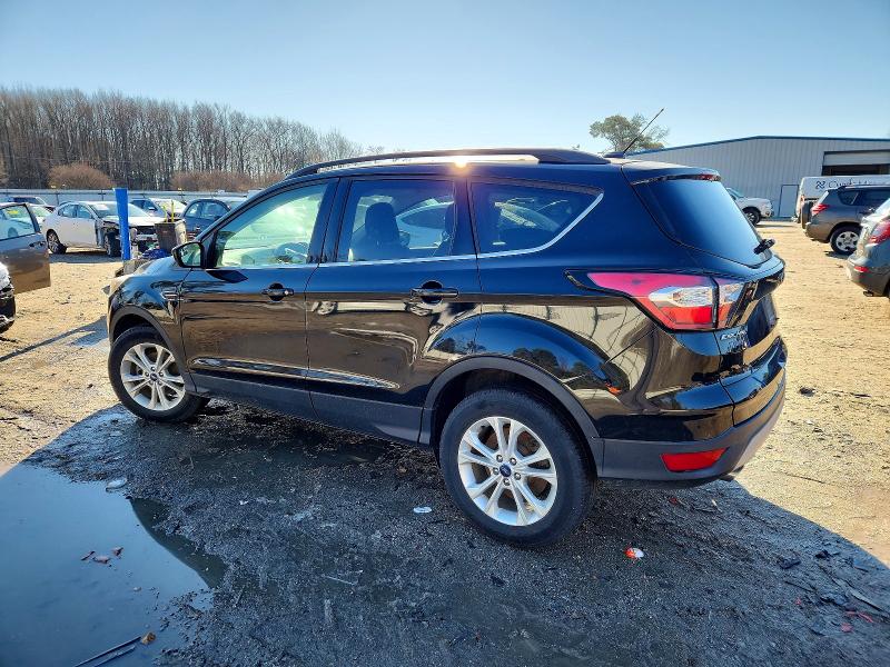 Photo 2 from auction – 2018 FORD ESCAPE SE with VIN 1FMCU0GD8JUB19365