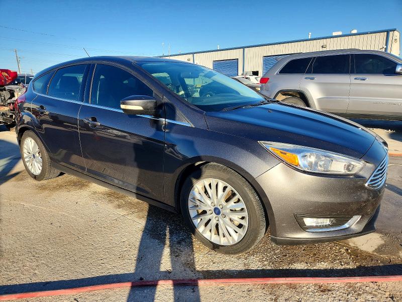 Photo 4 from auction – 2017 FORD FOCUS TITA with VIN 1FADP3N29HL320569
